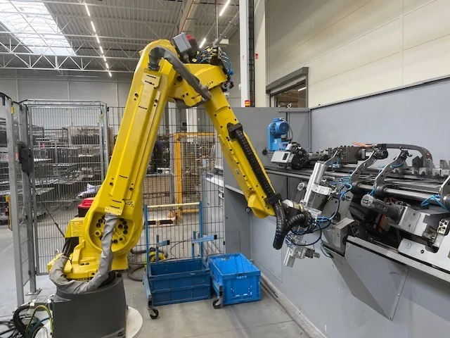 Industrial robot tending a machine